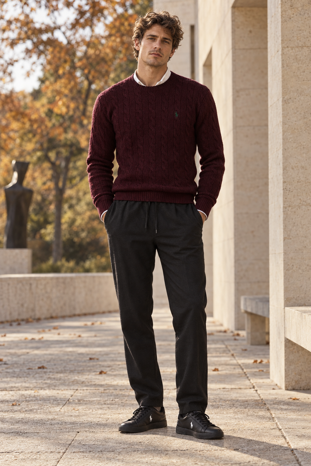 Burgundy Ralph Lauren cable knit with black Zara trousers and Ralph Lauren trainers