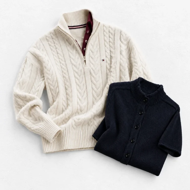 Tommy hilfiger Cable Knit Quarter-Zip Sweater and Zara SHORT-SLEEVED CARDIGAN arranged on a white cement background